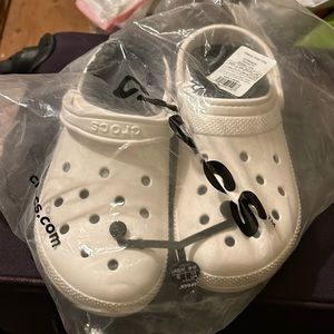 Unisex white crocs lined grey fur